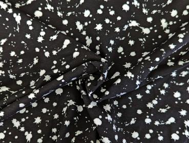 Baumwolljersey Weiße Farbkleckse auf Schwarz 35 x 150 cm